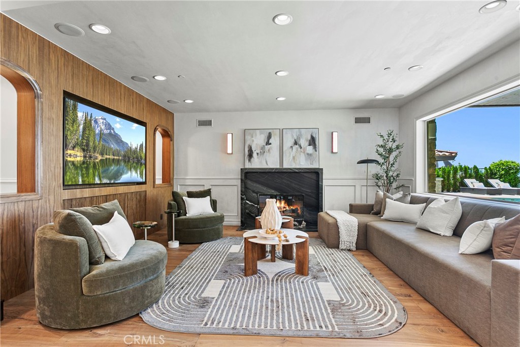 7 Kent Court Ladera Ranch, CA 92694 - Photo 17 of 49 a living room with furniture and a fireplace