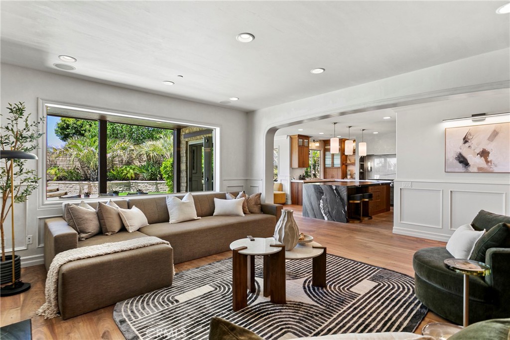 7 Kent Court Ladera Ranch, CA 92694 - Photo 18 of 49 a living room with furniture and a large window