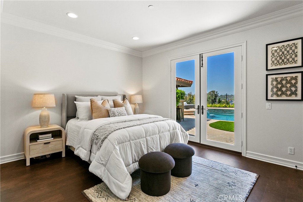 7 Kent Court Ladera Ranch, CA 92694 - Photo 25 of 49 a bedroom with a bed and a large window
