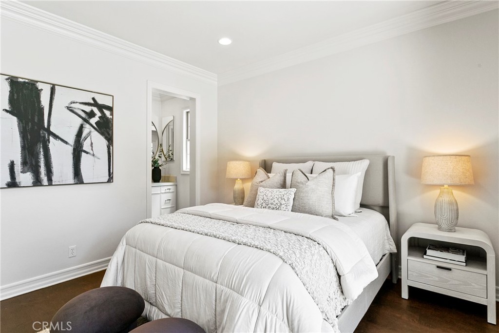 7 Kent Court Ladera Ranch, CA 92694 - Photo 26 of 49 a bedroom with a bed and a lamp