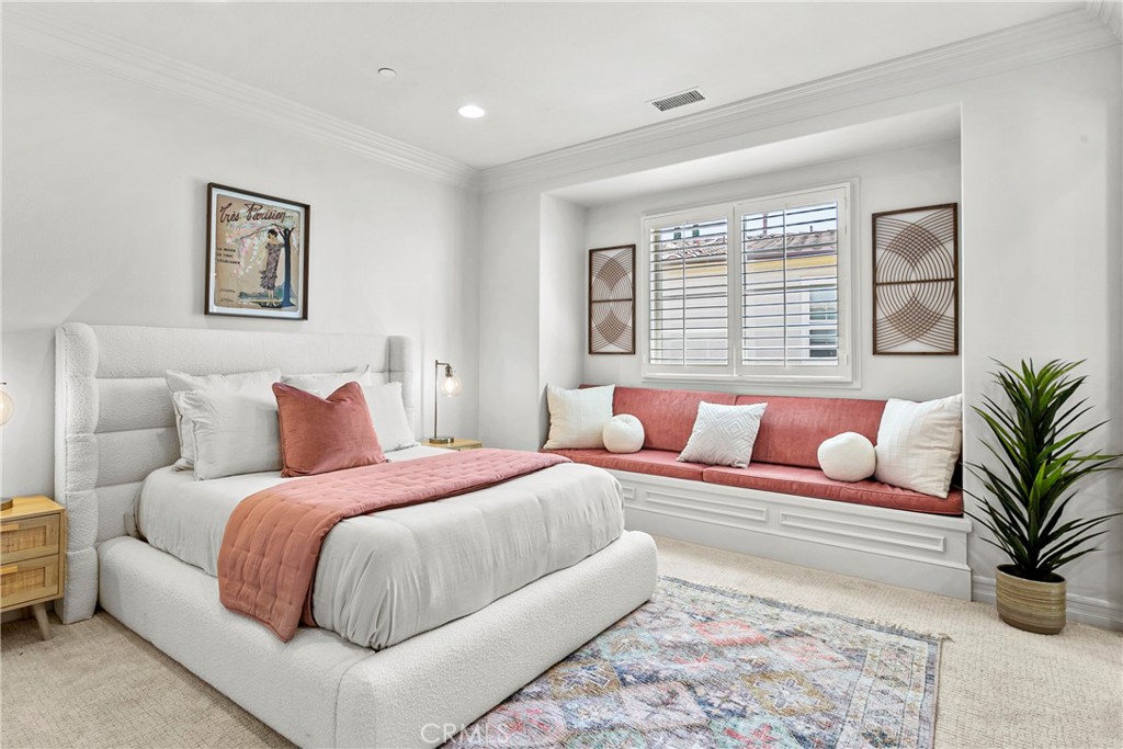 7 Kent Court Ladera Ranch, CA 92694 - Photo 41 of 49 a bedroom with a large bed and a couch