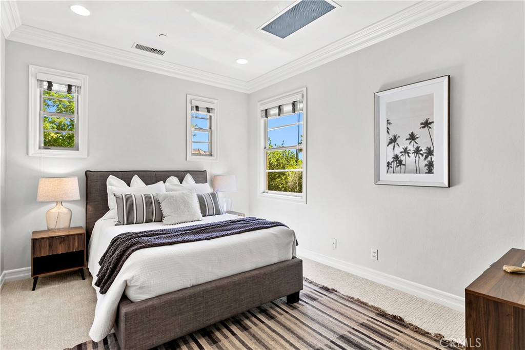7 Kent Court Ladera Ranch, CA 92694 - Photo 44 of 49 a bedroom with a bed and a window