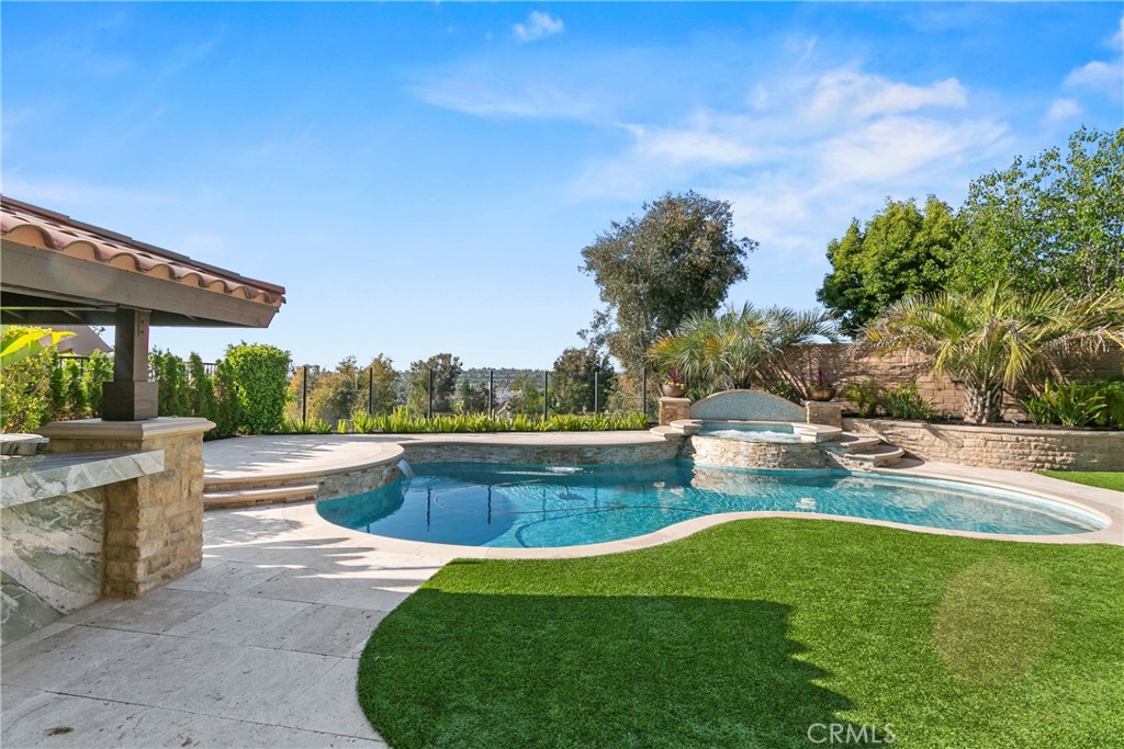 7 Kent Court Ladera Ranch, CA 92694 - Photo 46 of 49 a view of swimming pool with outdoor seating and plants