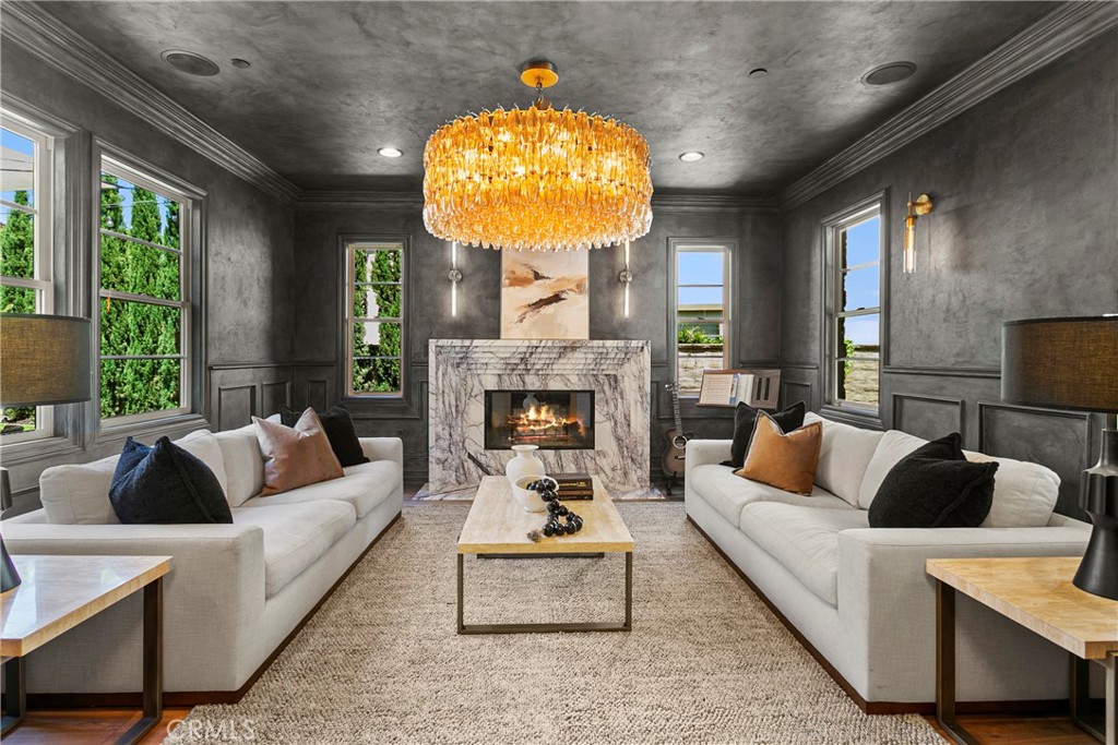 7 Kent Court Ladera Ranch, CA 92694 - Photo 7 of 49 a living room with furniture and a fireplace