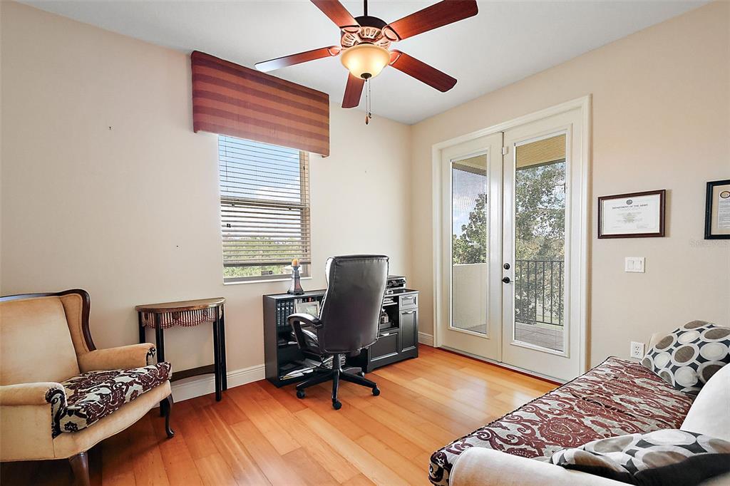 212 Crestrun Loop Leesburg, FL 34748 - Photo 36 of 47 a bedroom with furniture and a window