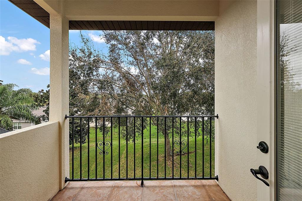 212 Crestrun Loop Leesburg, FL 34748 - Photo 42 of 47 a view of a balcony
