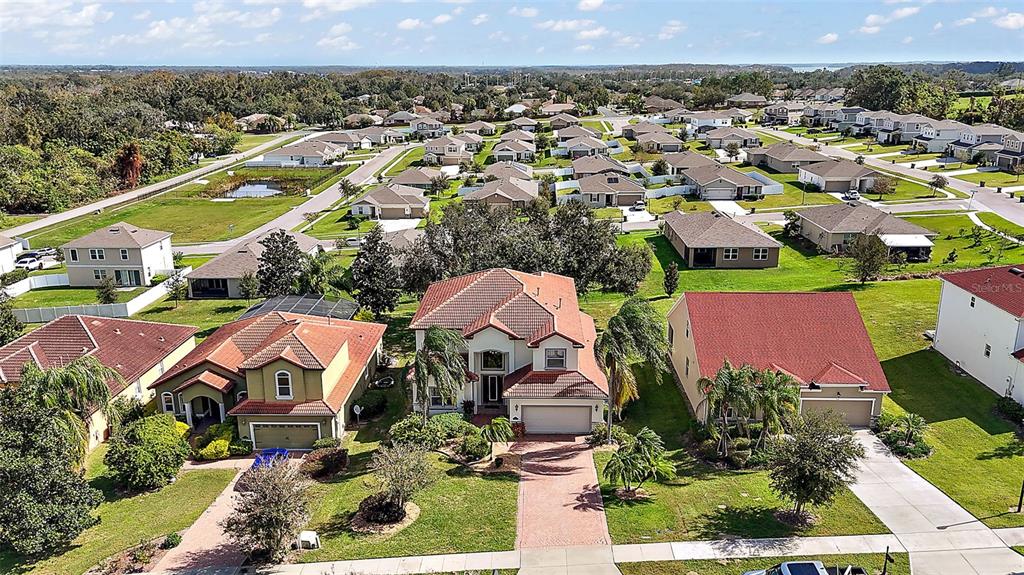 212 Crestrun Loop Leesburg, FL 34748 - Photo 47 of 47 an aerial view of multiple houses
