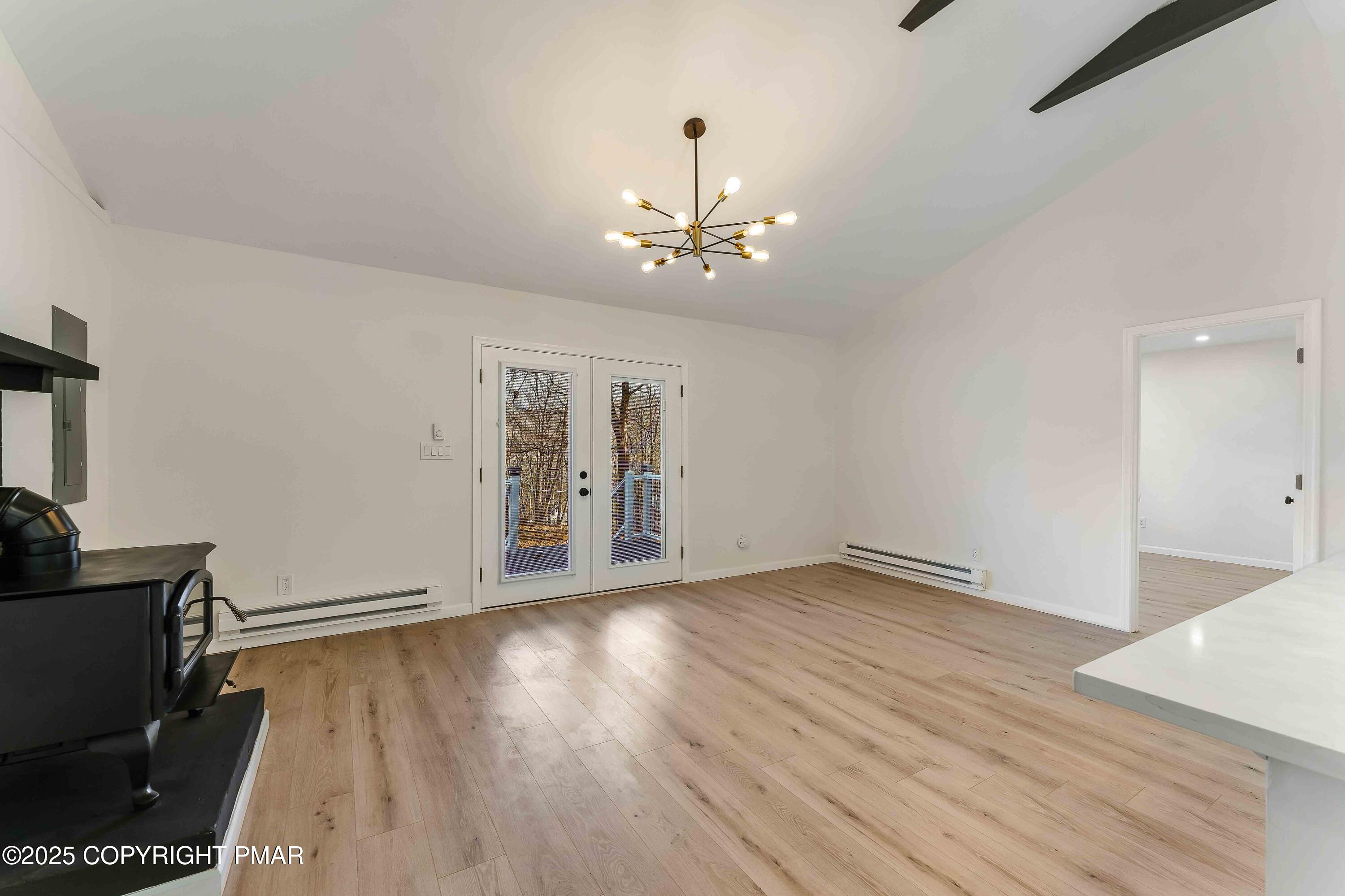 218 Vista Road Cresco, PA 18326 - Photo 15 of 54 a view of an empty room with wooden floor and a window