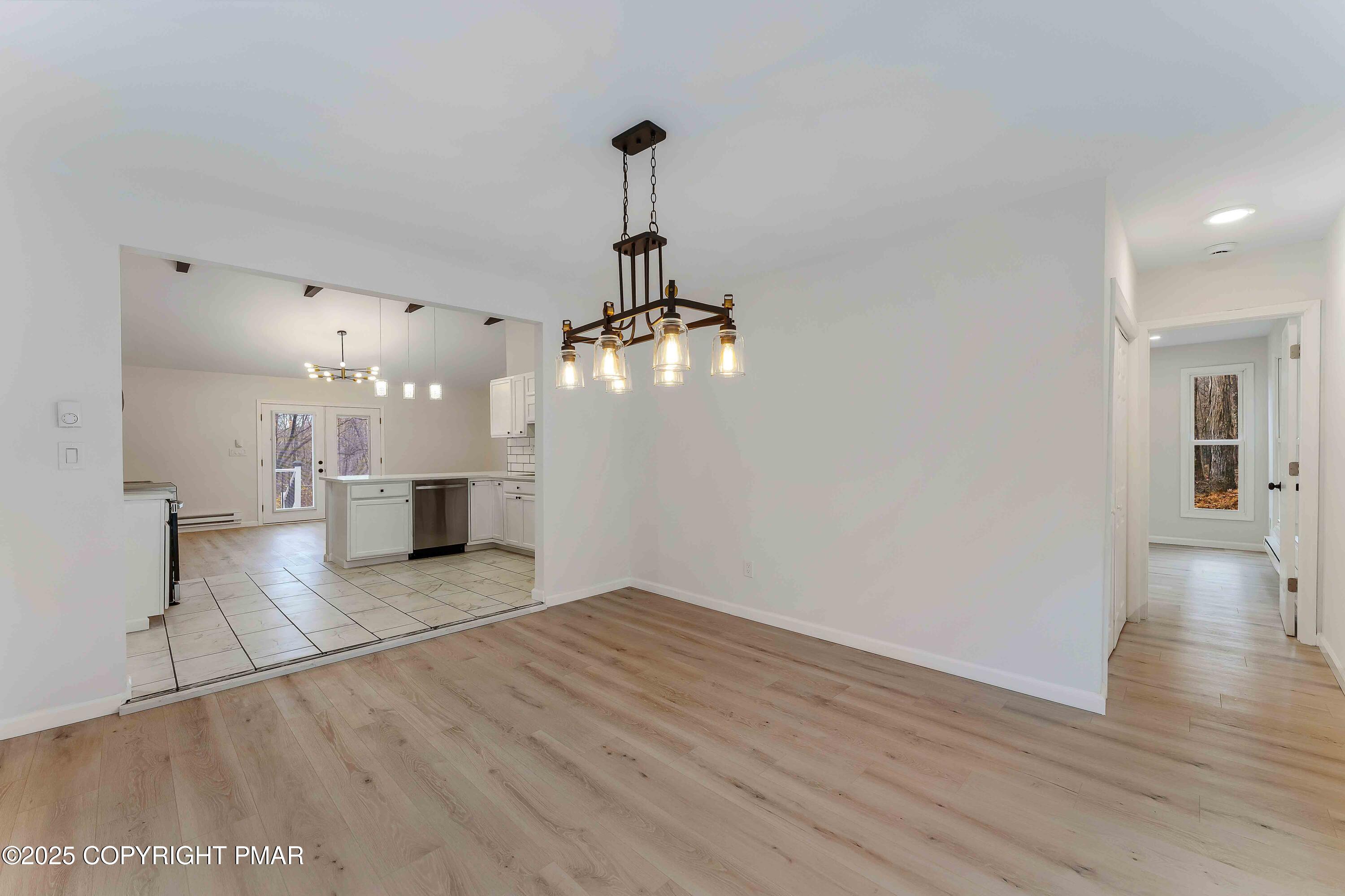 218 Vista Road Cresco, PA 18326 - Photo 29 of 54 a view of a kitchen with a sink and dishwasher with wooden floor