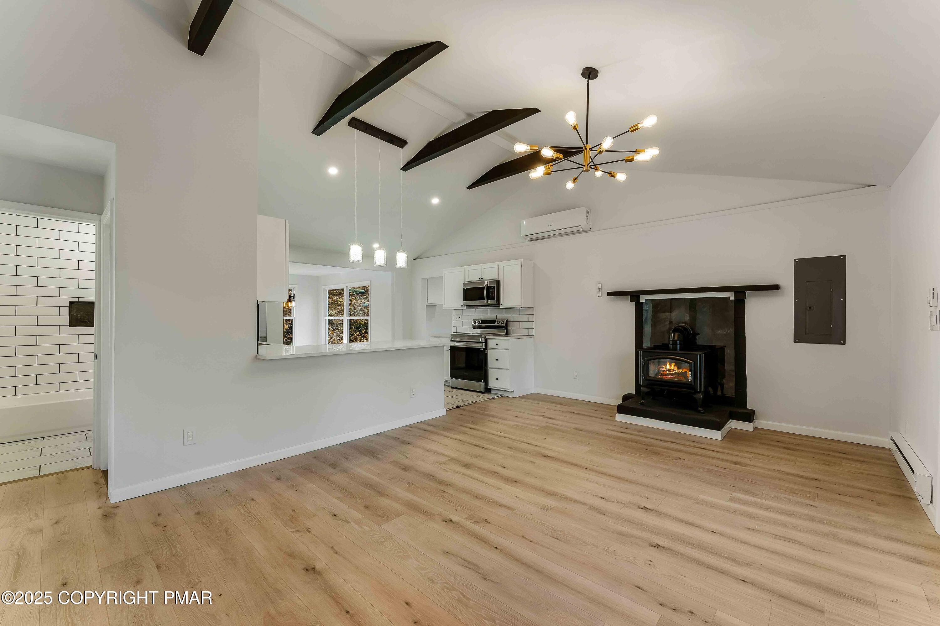 218 Vista Road Cresco, PA 18326 - Photo 3 of 54 an empty room with fan and windows