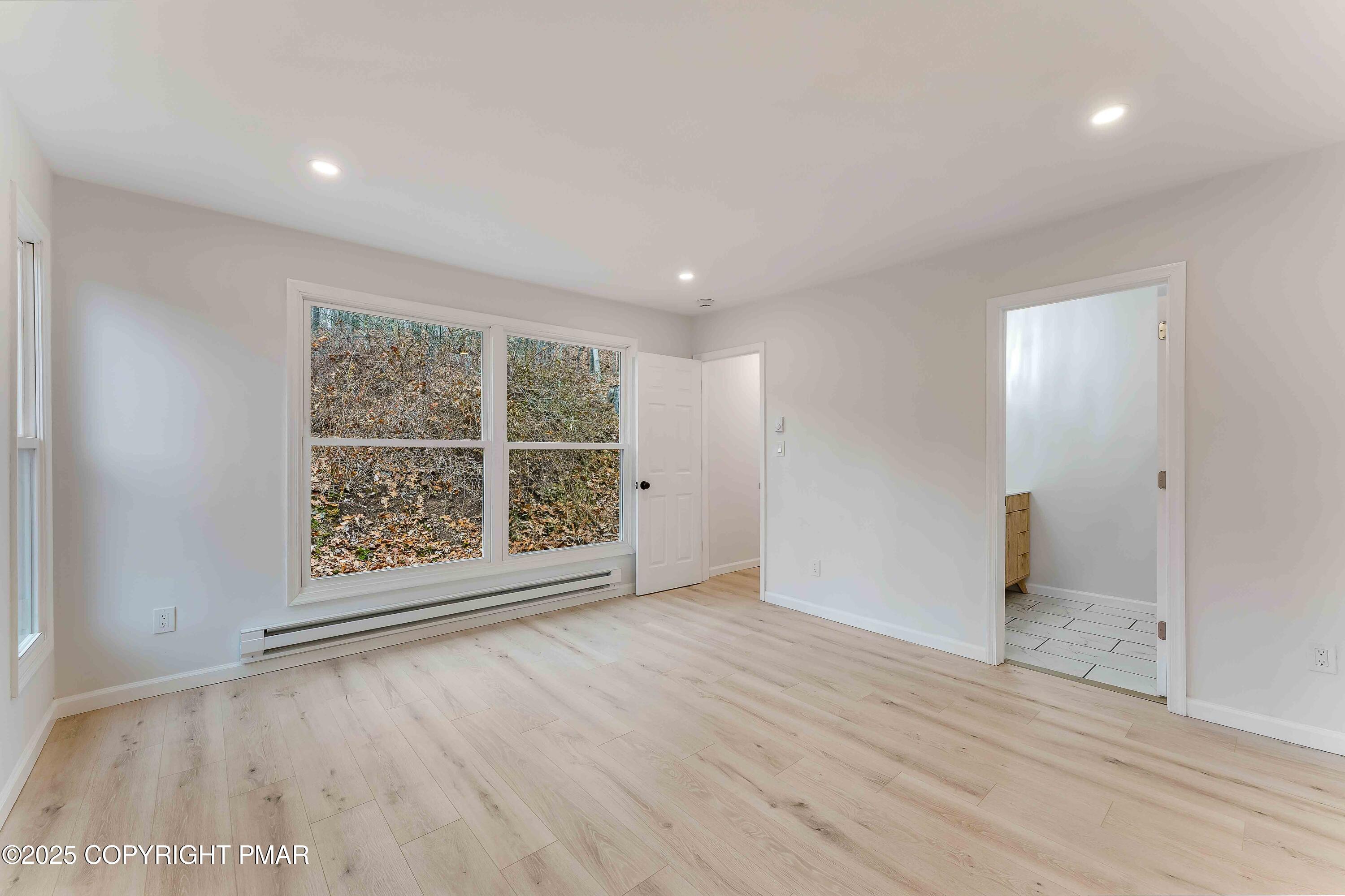 218 Vista Road Cresco, PA 18326 - Photo 34 of 54 wooden floor in an empty room with a window