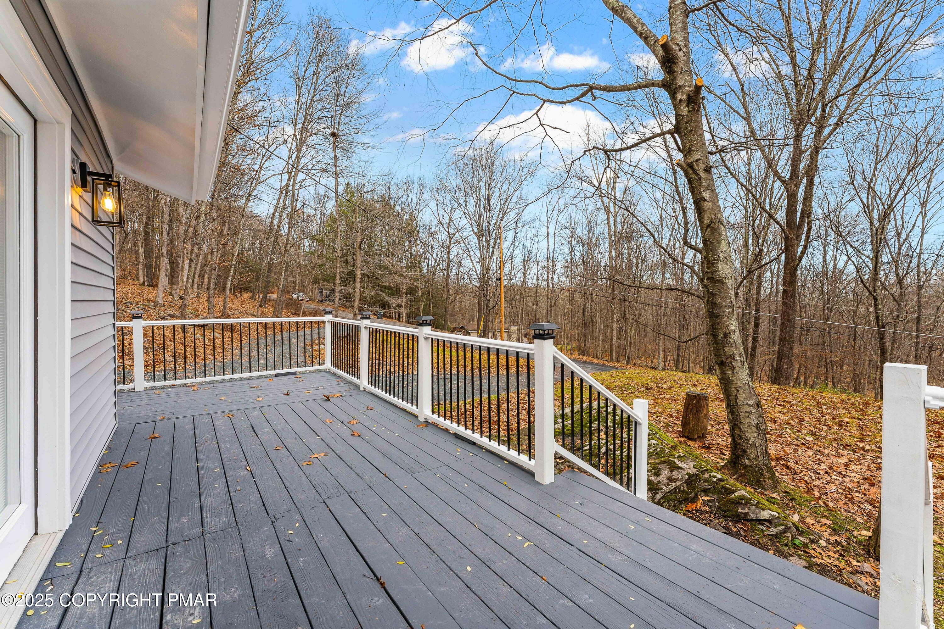 218 Vista Road Cresco, PA 18326 - Photo 43 of 54 a view of a balcony with wooden floor and fence