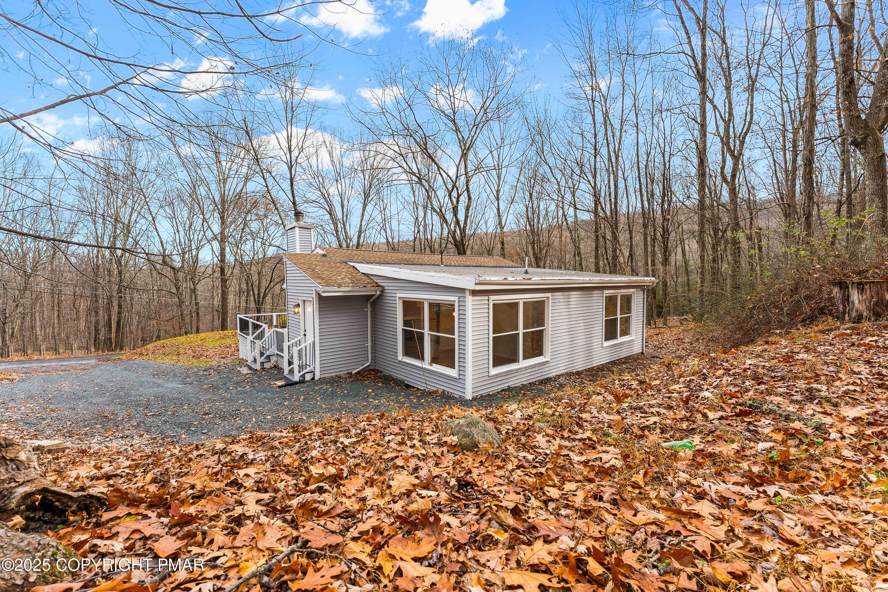 218 Vista Road Cresco, PA 18326 - Photo 44 of 54 a view of a house with a yard