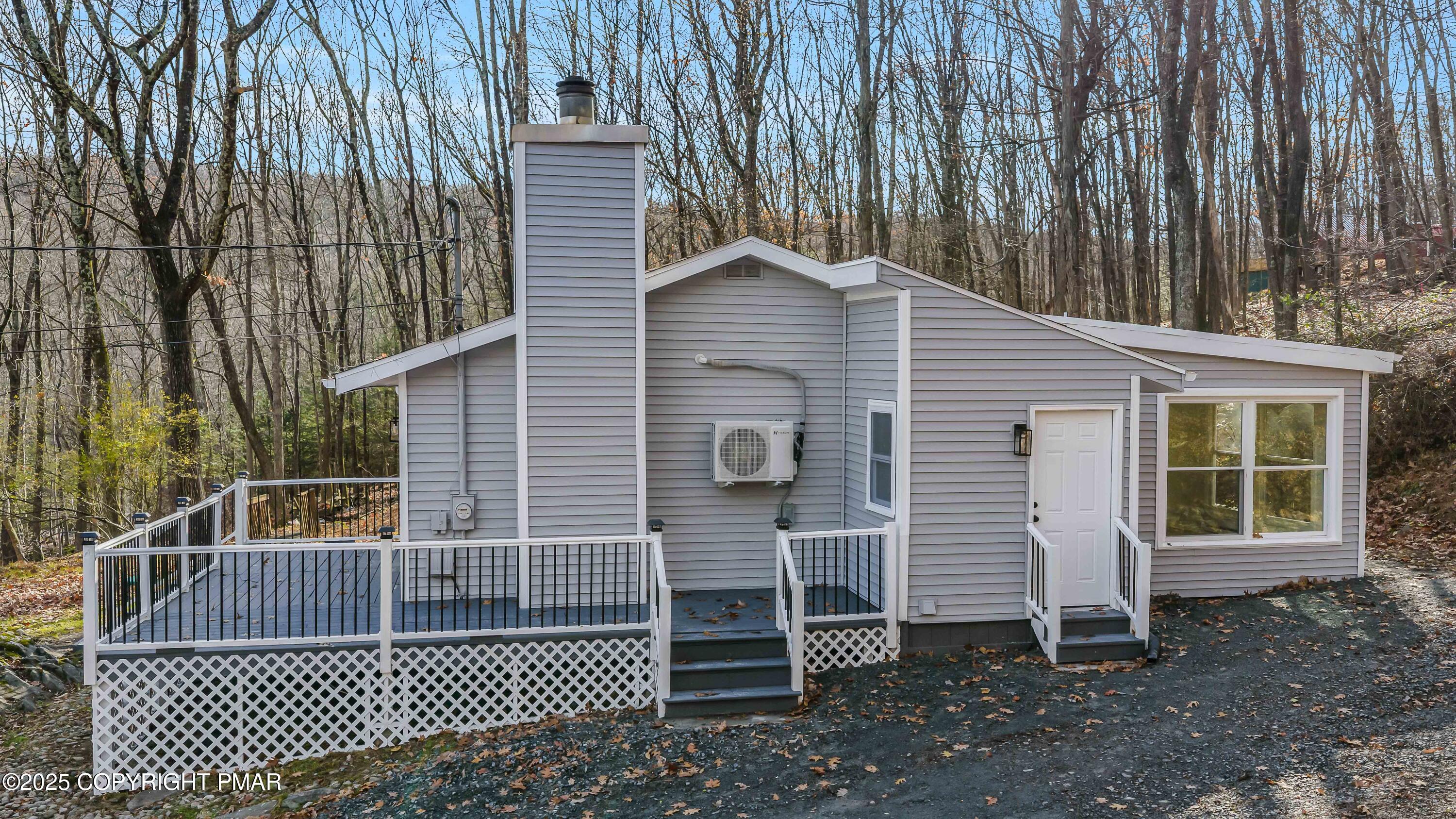 218 Vista Road Cresco, PA 18326 - Photo 45 of 54 a front view of a house with a garden