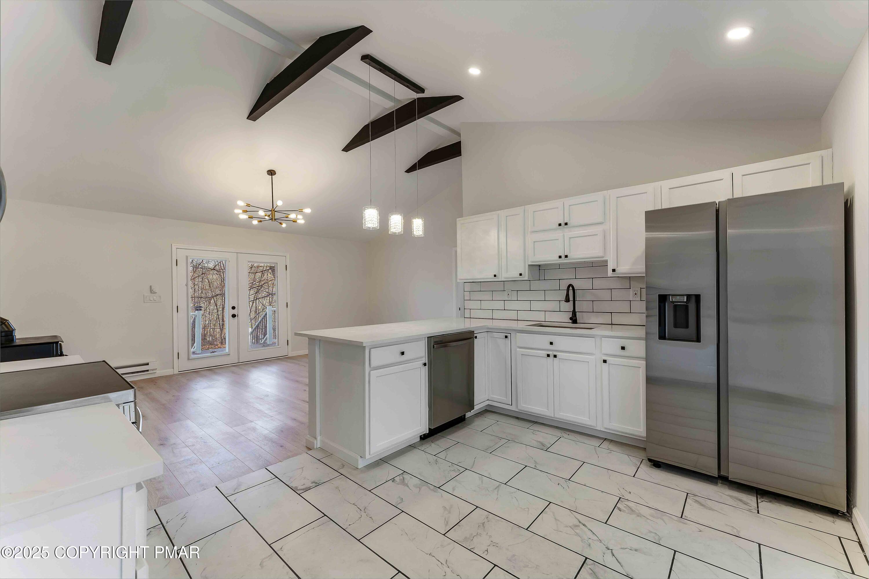 218 Vista Road Cresco, PA 18326 - Photo 9 of 54 a large kitchen with cabinets and stainless steel appliances