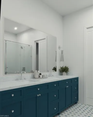 a bathroom with a double vanity sink and mirror