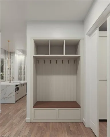 a view of entryway with wooden floor