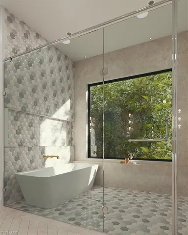 a view of a bathtub in front of a window