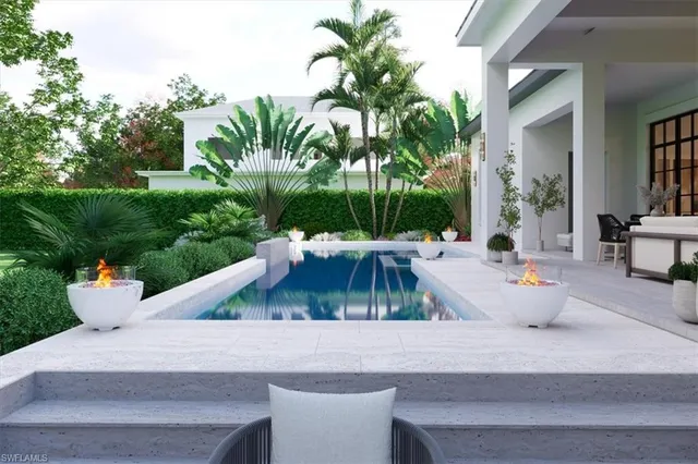 an outdoor space with patio furniture and a garden