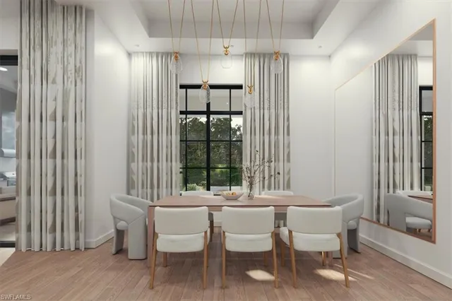 a dining room with furniture and window