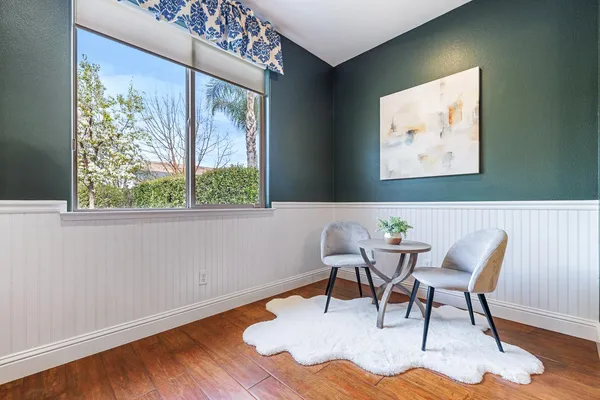a view of a livingroom with furniture and windows