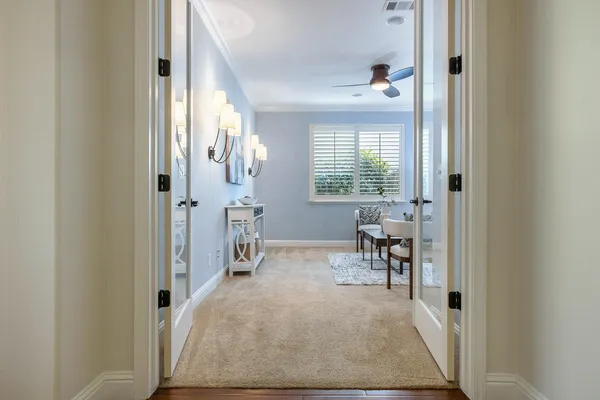 a living room with furniture and a window
