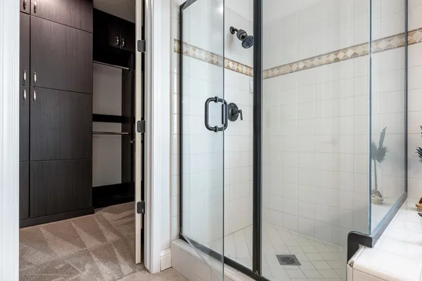 a bathroom with a tub and a sink