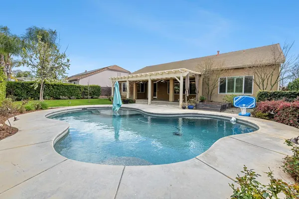 a lobby with furniture and garden view