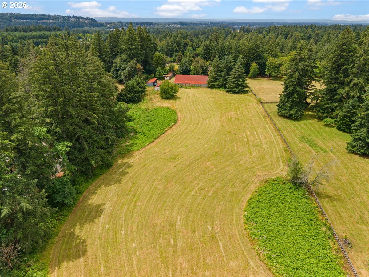 27214 Northeast Robinson Road Camas, WA 98607 - Photo 2 of 24 a view of a swimming pool and an outdoor space