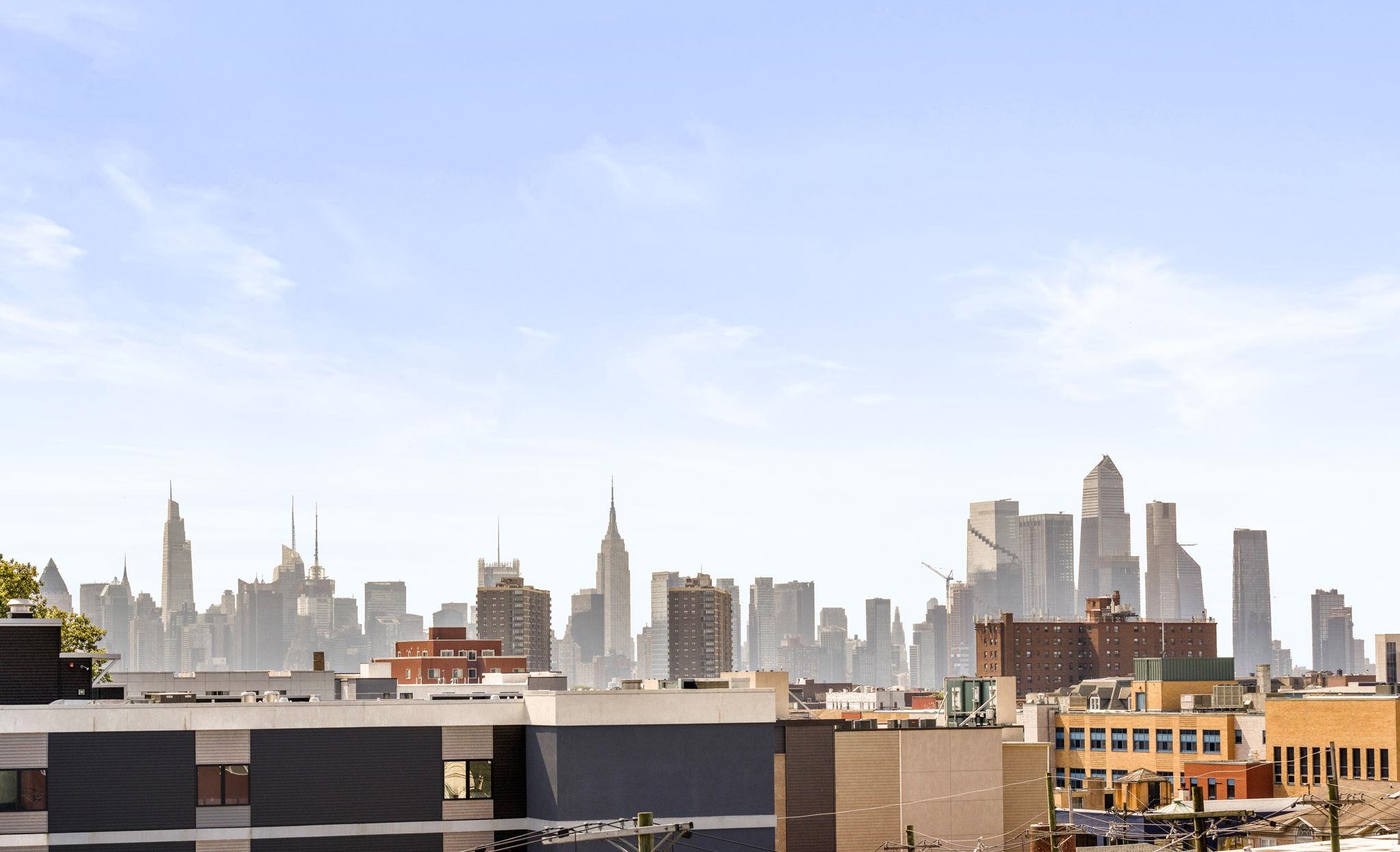 5711 John F. Kennedy Boulevard, Unit 306 North Bergen, NJ 07047 - Photo 23 of 31 a view of a city with tall buildings