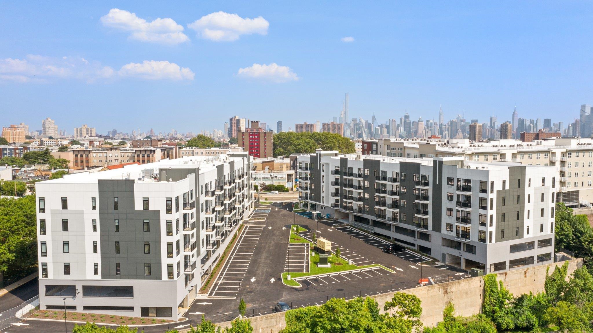 5711 John F. Kennedy Boulevard, Unit 306 North Bergen, NJ 07047 - Photo 29 of 31 a view of a city with tall buildings