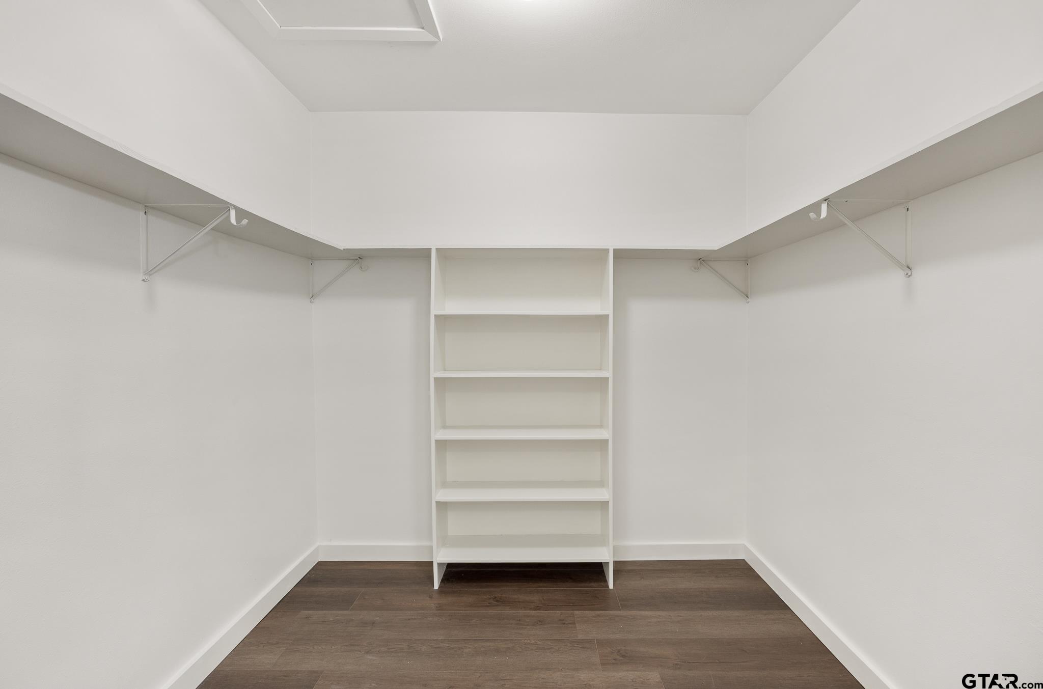 1538 North Hill Road Tyler, TX 75702 - Photo 29 of 29 a view of walk in closet with empty racks