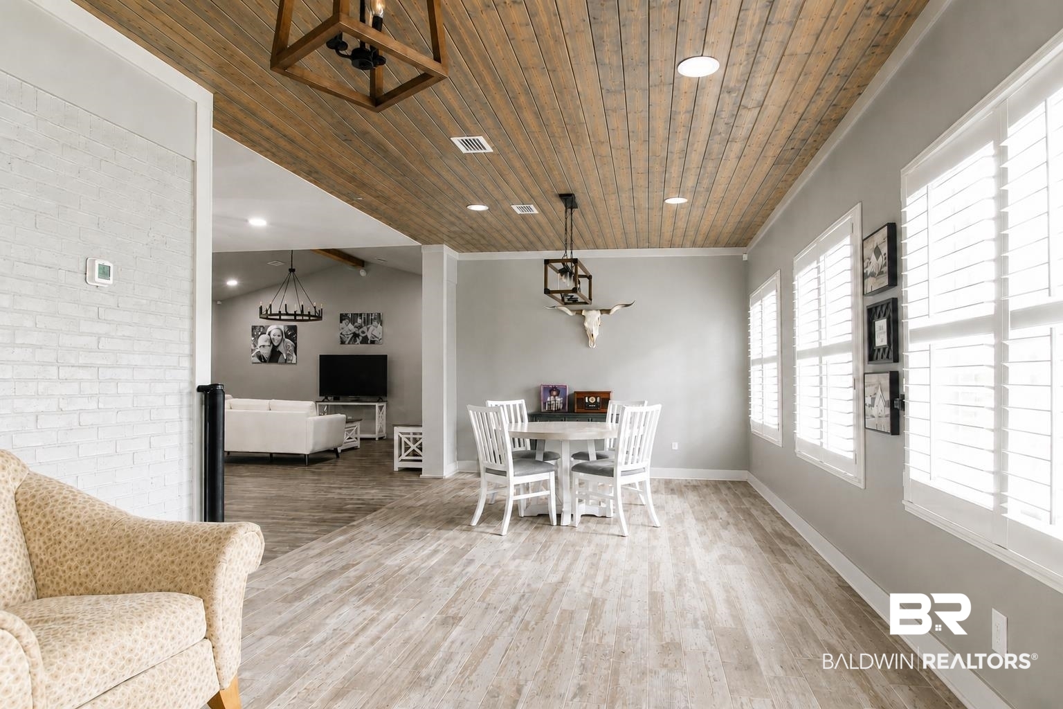 9825 Wolf Creek Ridge Elberta, AL 36530 - Photo 27 of 76 Open-concept living space featuring wood-finish flooring, a wood plank ceiling, and recessed lighting