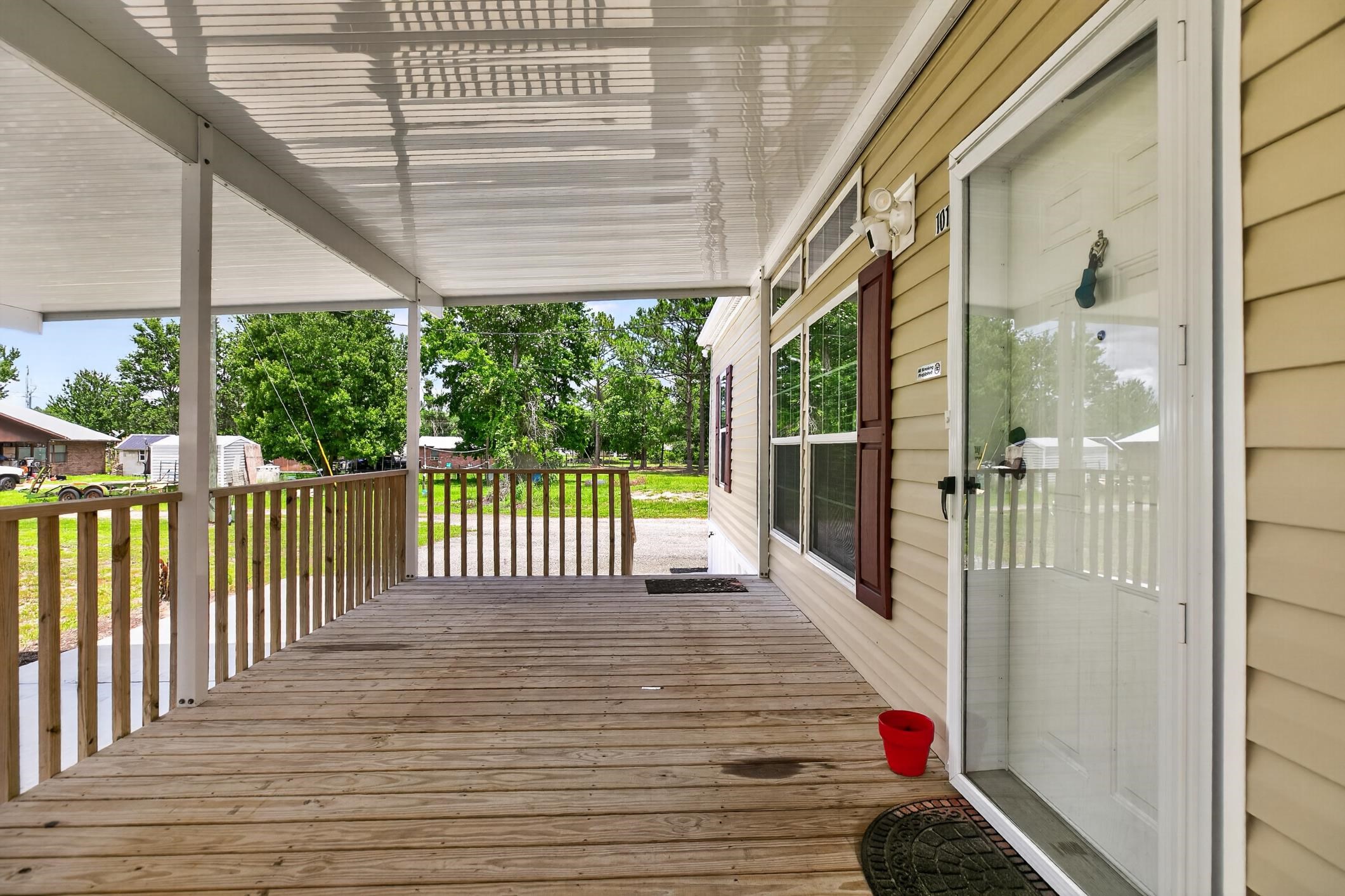 101 Trout Trail Crescent City, FL 32112 - Photo 4 of 45 a view of a balcony with wooden floor