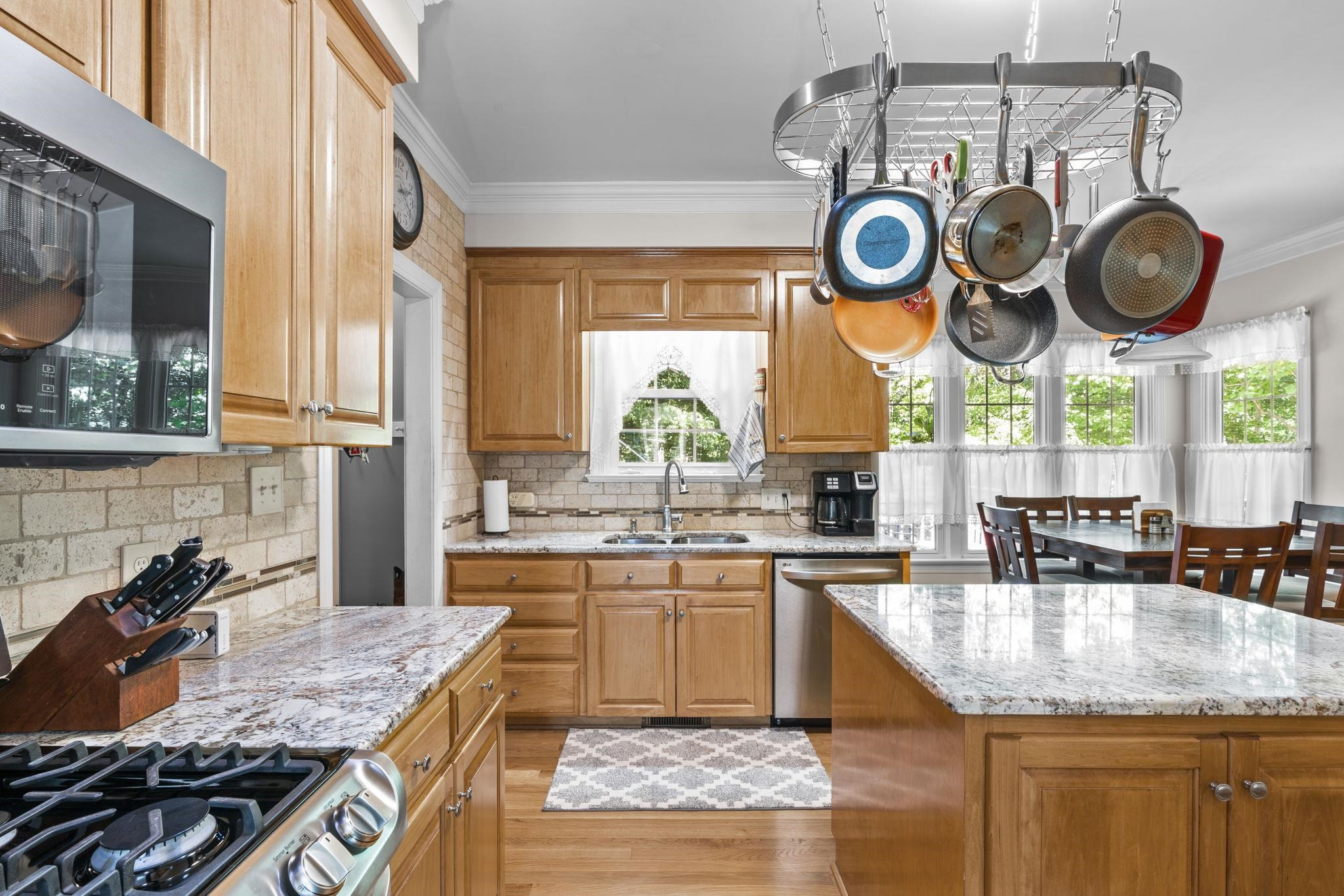 7705 Tylerton Drive Raleigh, NC 27613 - Photo 11 of 35 Stainless Steel Appliance with Gas Stove and Convection Microwave