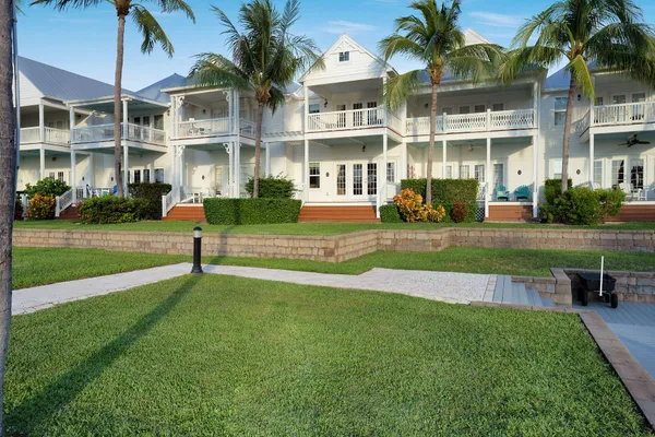 a view of a building with a yard