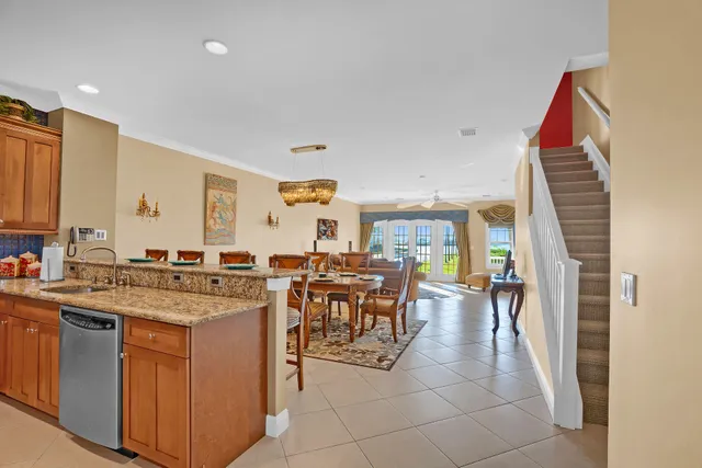 a view of a kitchen and dining room