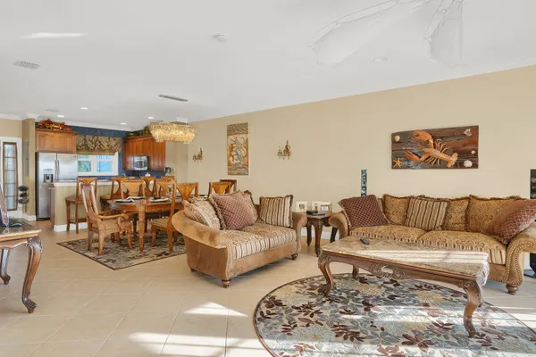 a living room with furniture and a table