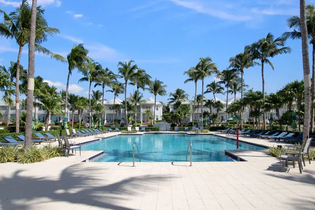 a view of a swimming pool with an outdoor space and seating area