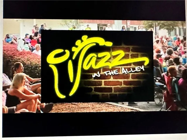 a sign that is sitting on a brick wall