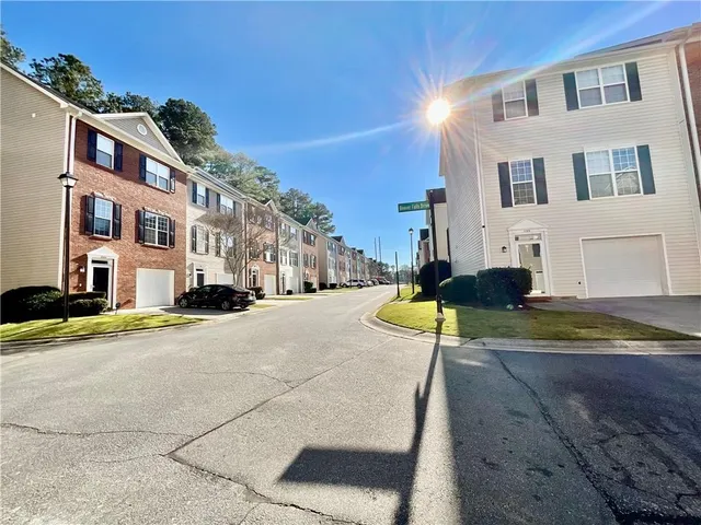 a view of a street with houses