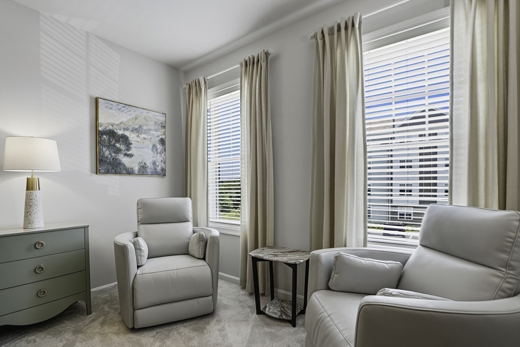 2 Codman Way, Unit 2203 Westborough, MA 01581 - Photo 17 of 36 a living room with furniture and a window