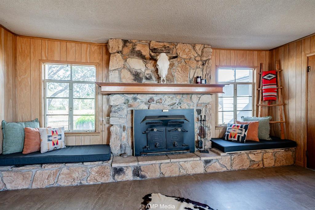 4538 463rd Rule, TX 79548 - Photo 12 of 39 a living room with furniture and a fireplace