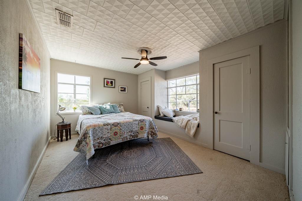 4538 463rd Rule, TX 79548 - Photo 16 of 39 a spacious bedroom with a bed couch and a window