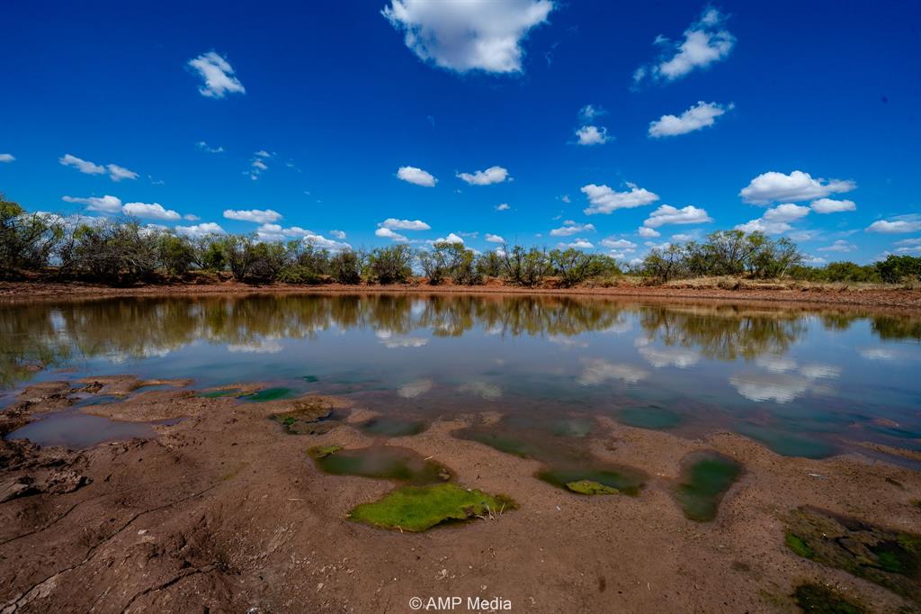 4538 463rd Rule, TX 79548 - Photo 23 of 39 a view of a lake with lawn chairs