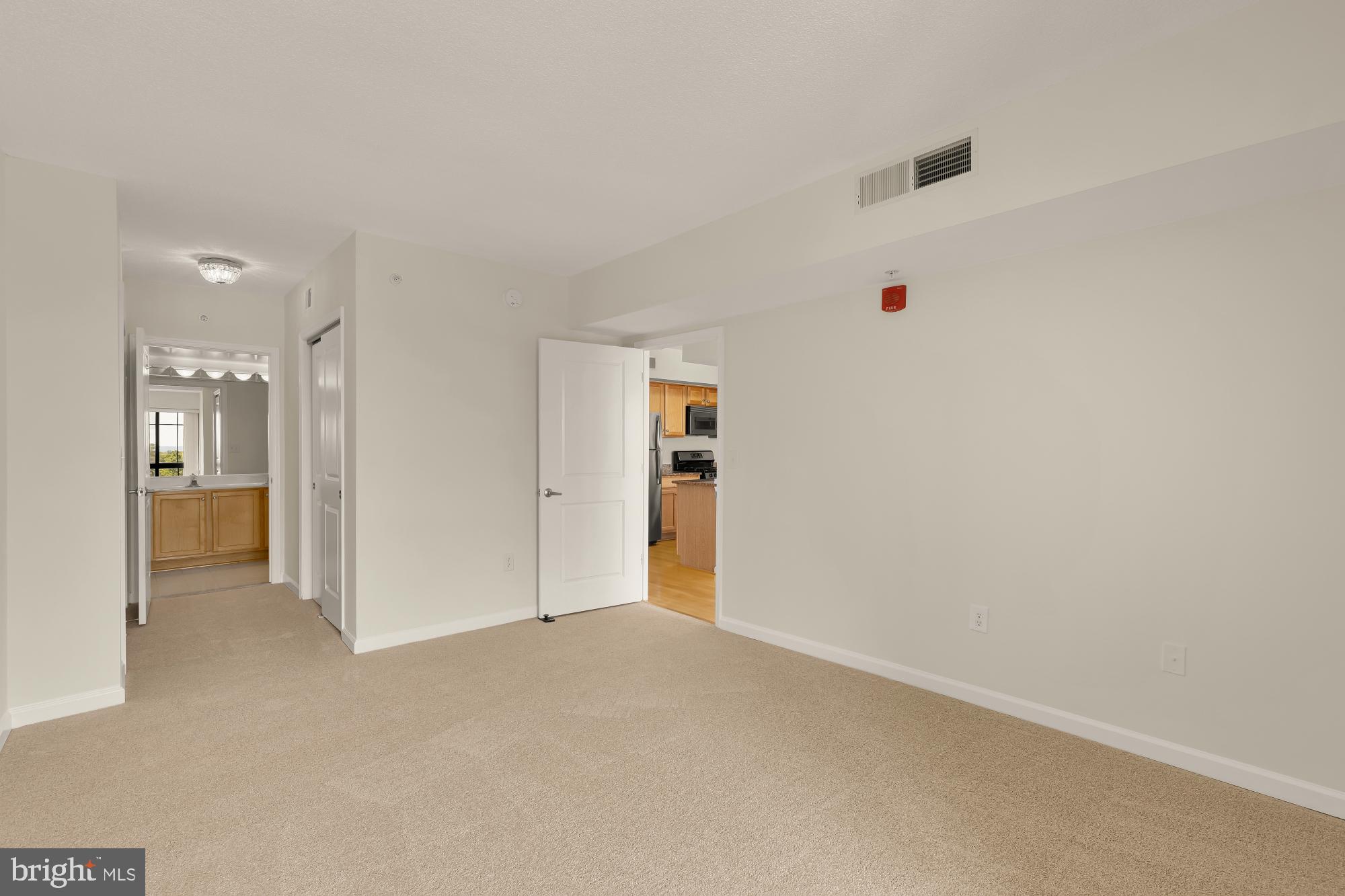 7915 Eastern Avenue Northwest, Unit 1014 Silver Spring, MD 20910 - Photo 22 of 33 Oversized primary bedroom suite (un-staged)
