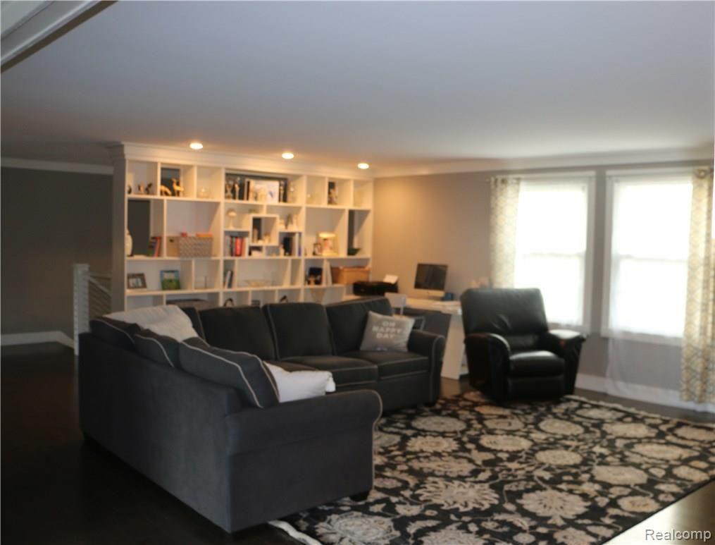 71950 Dequindre Road Romeo, MI 48065 - Photo 13 of 39 Upper level great room w/ built in shelving