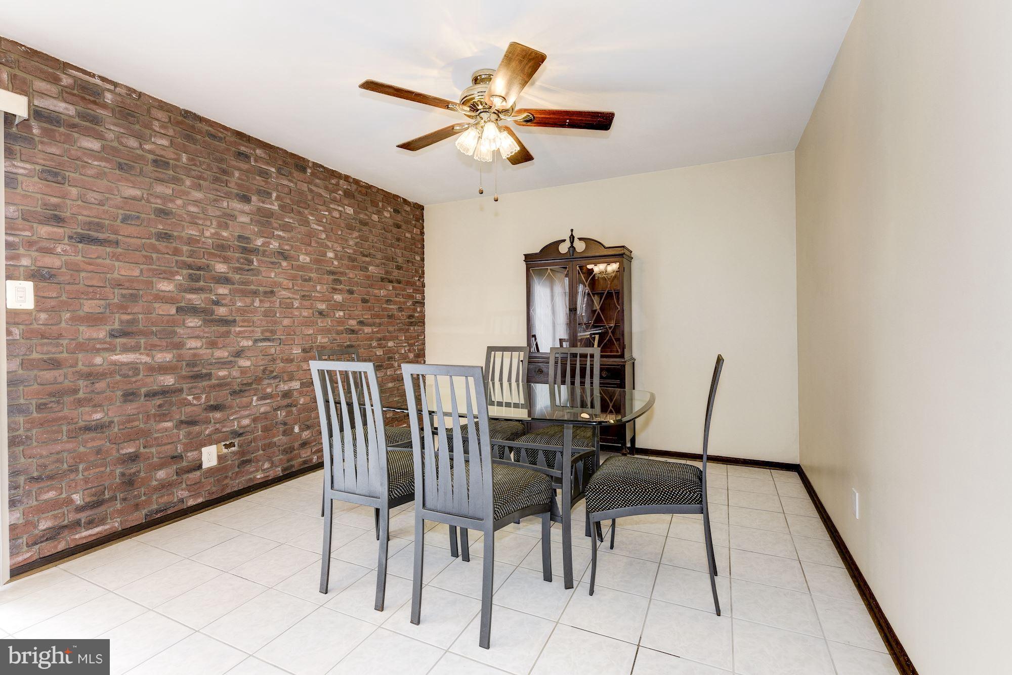 2418 Hopewell Road Marlton, NJ 08053 - Photo 14 of 42 a view of a dining room with furniture and a rug