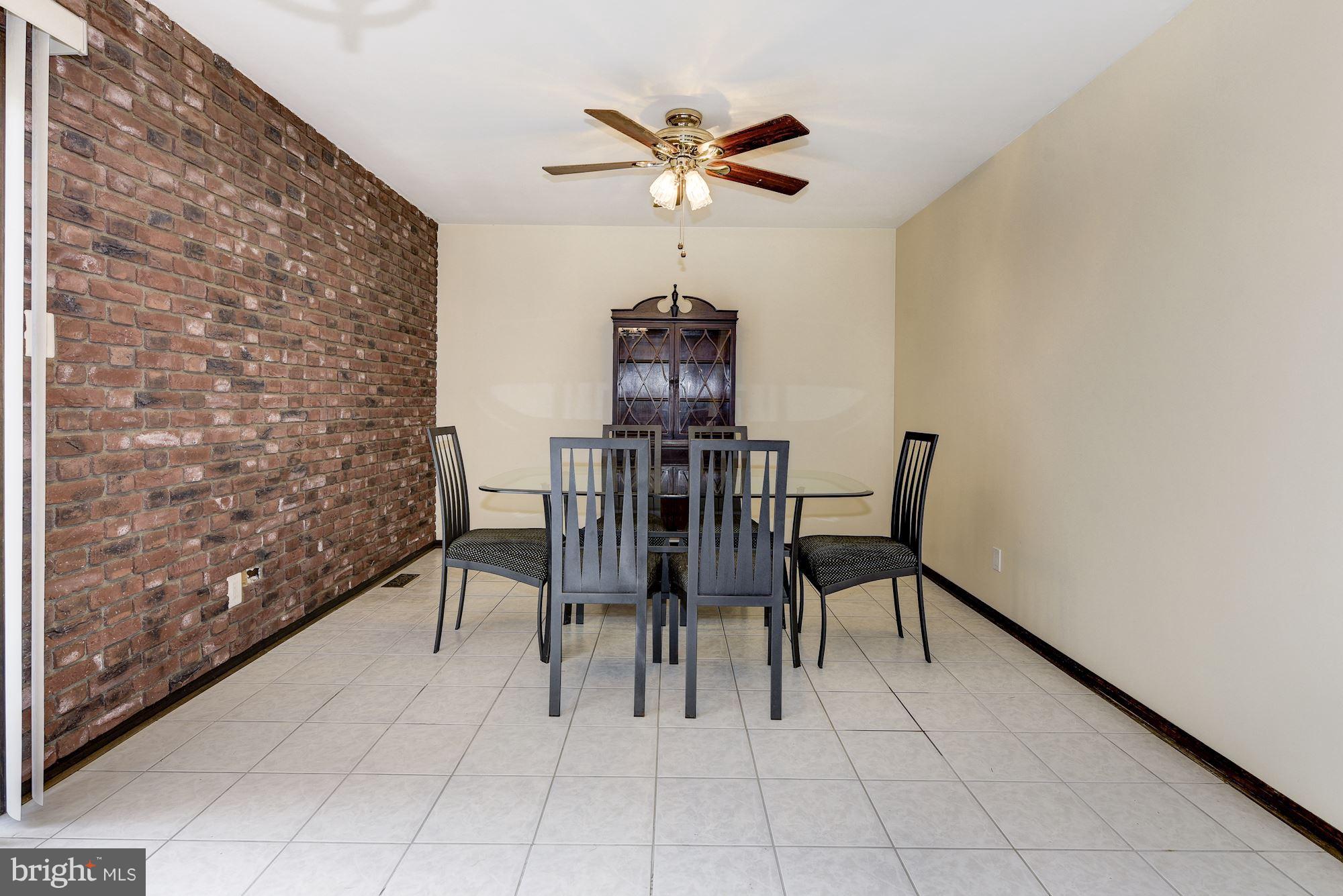 2418 Hopewell Road Marlton, NJ 08053 - Photo 16 of 42 a view of a dining room with furniture and chandelier fan