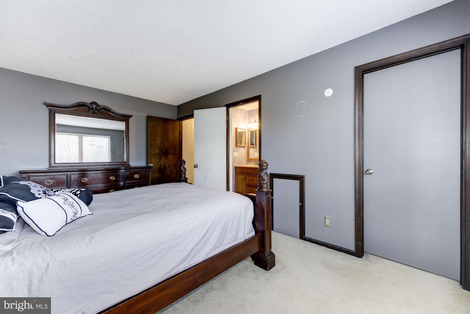 2418 Hopewell Road Marlton, NJ 08053 - Photo 20 of 42 a bedroom with a bed and window